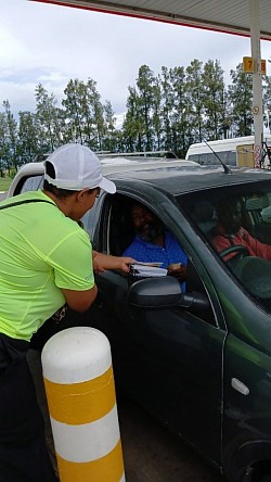 Spreading Road Safety Awareness: Our team engaged with drivers at the fuel station garage, distributing road safety educational materials, flyers, and giveaways to promote responsible driving habits.